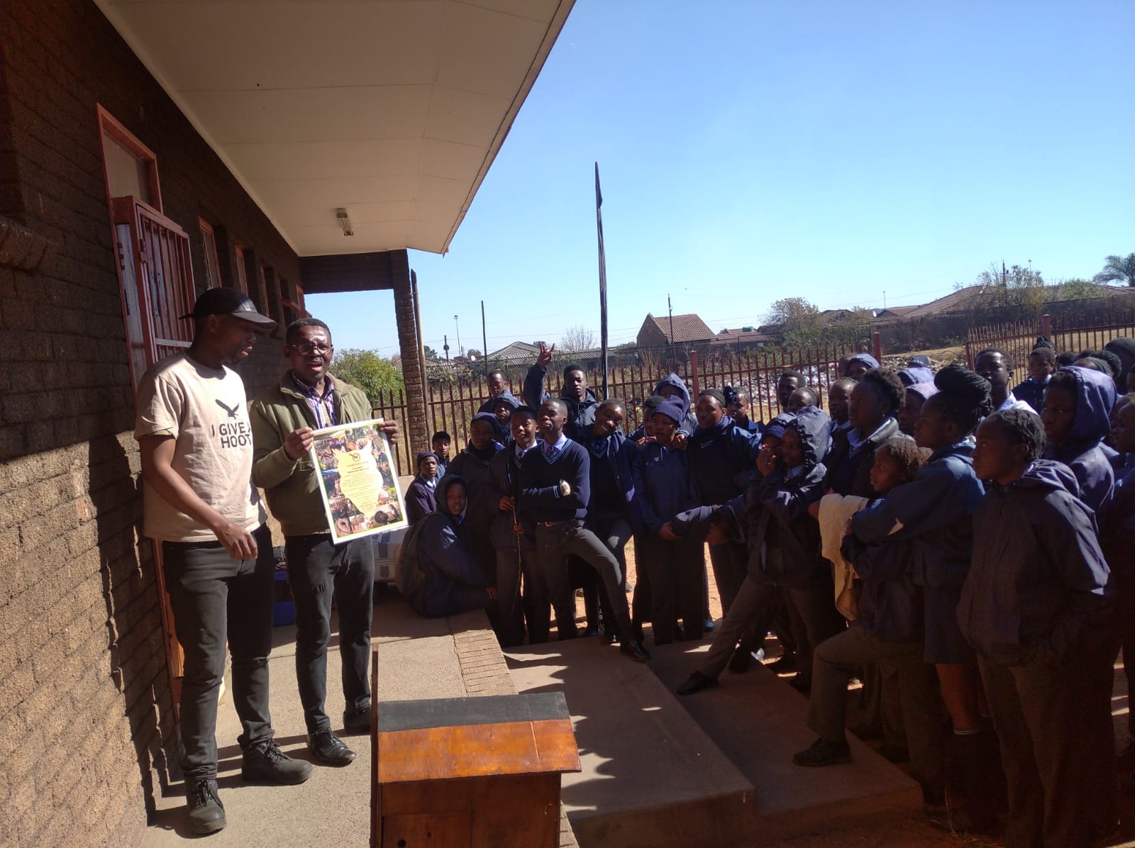 Bonginsimbi (Ntsane, teacher) with certificate.jpeg