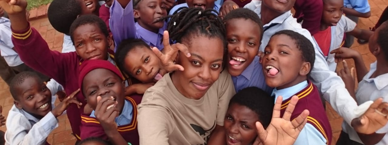 Delina With kids pic .png