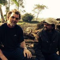 Jonathan Haw with member of the World Owl Centre in Nepal .jpeg